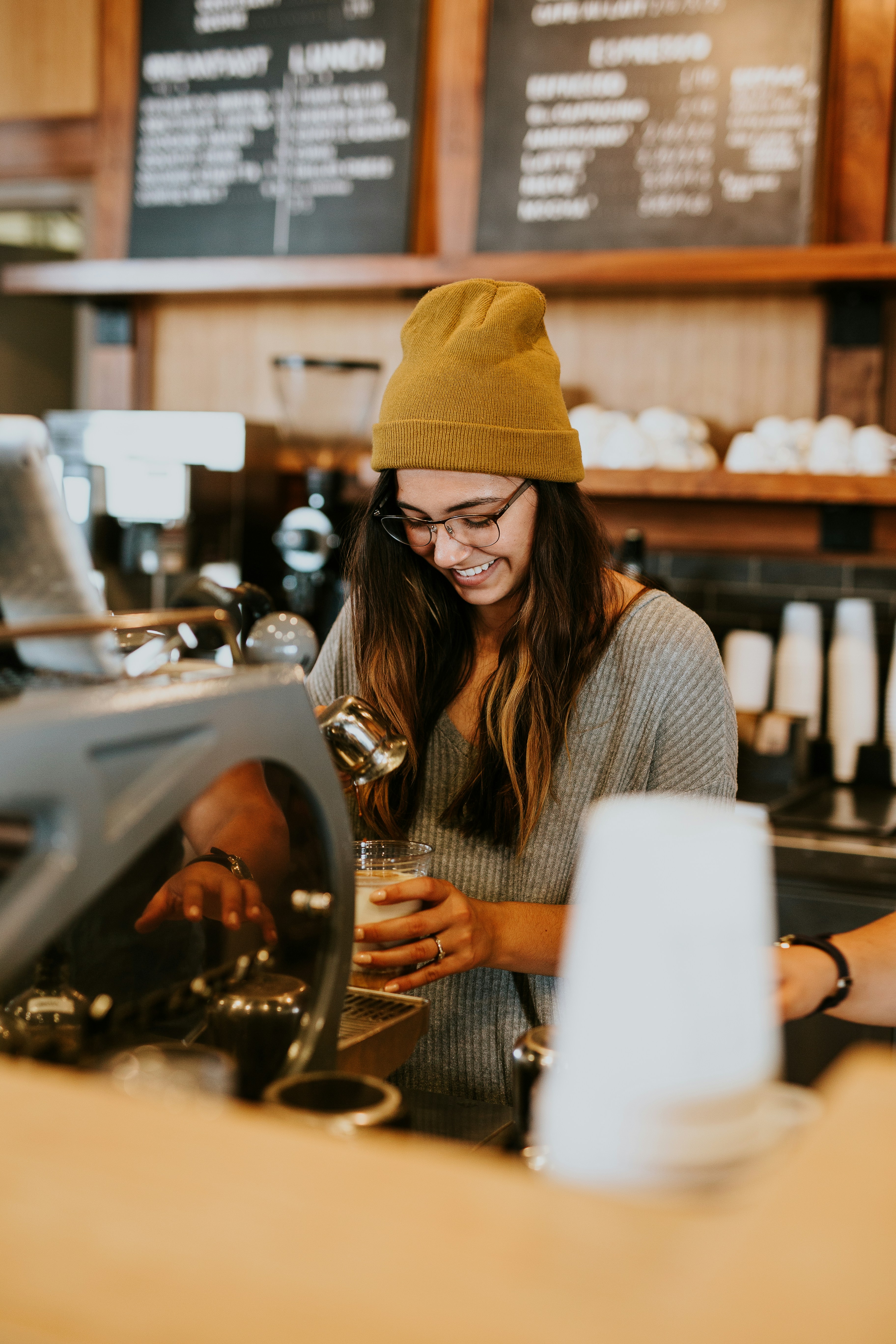 Barista pouring latte art