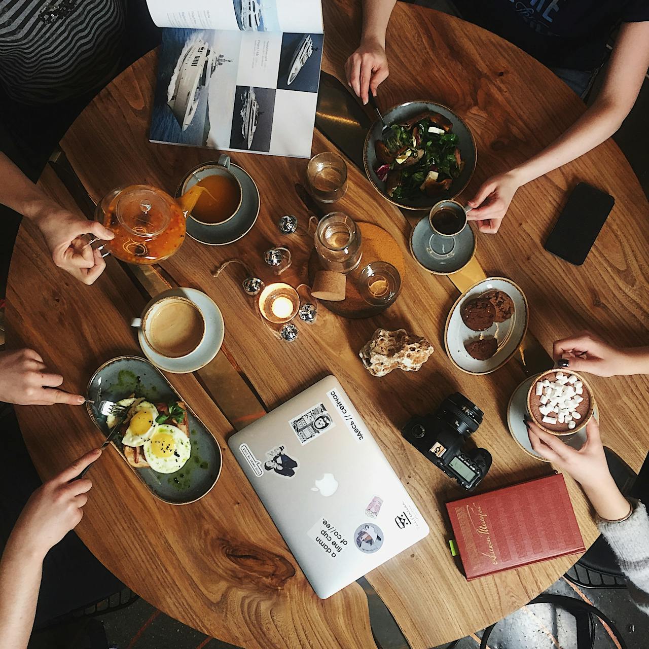 Fresh pastry and latte art on a café table, representing Jessi’s Coffee Co. inspiration